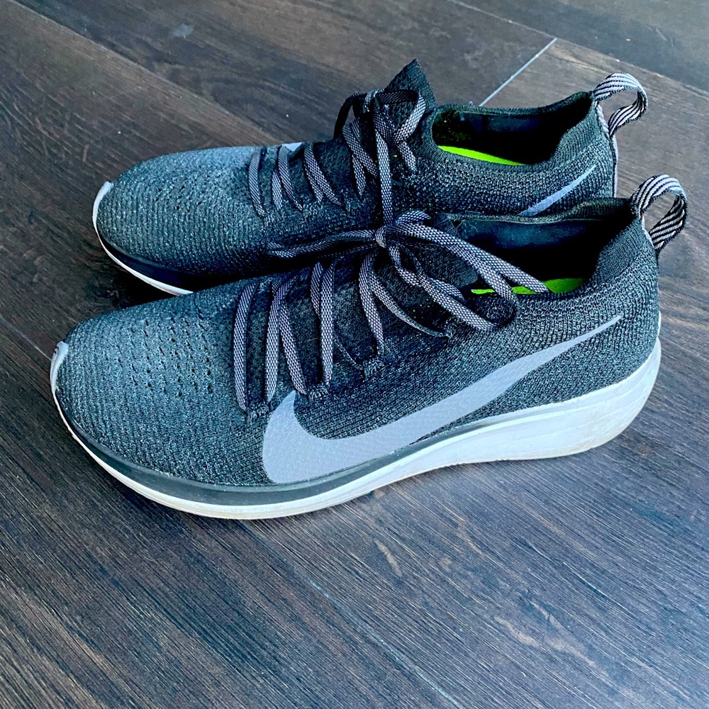 Black mesh Nike gym shoes. Size 7